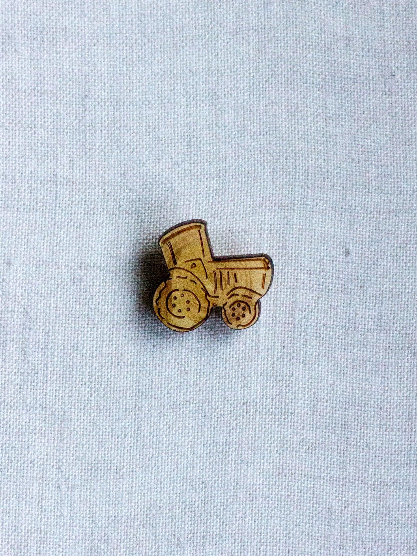 Picoti tractor button