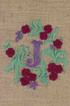 "I  or J " stamped on linen