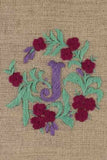 "I  or J " stamped on linen