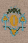 "O" stamped on linen