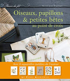 Oiseaux, papillons, petits bêtes au point de croix