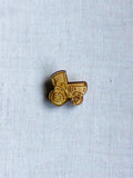 Picoti tractor button