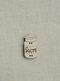Sugar canister button