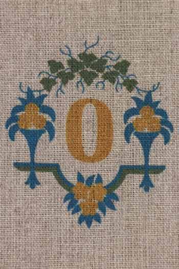 "O" stamped on linen