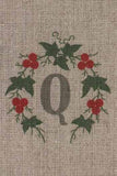 "Q" stamped on linen