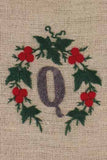 "Q" stamped on linen