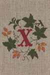 "X"  stamped on linen
