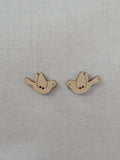 Flying bird button pair - large natural