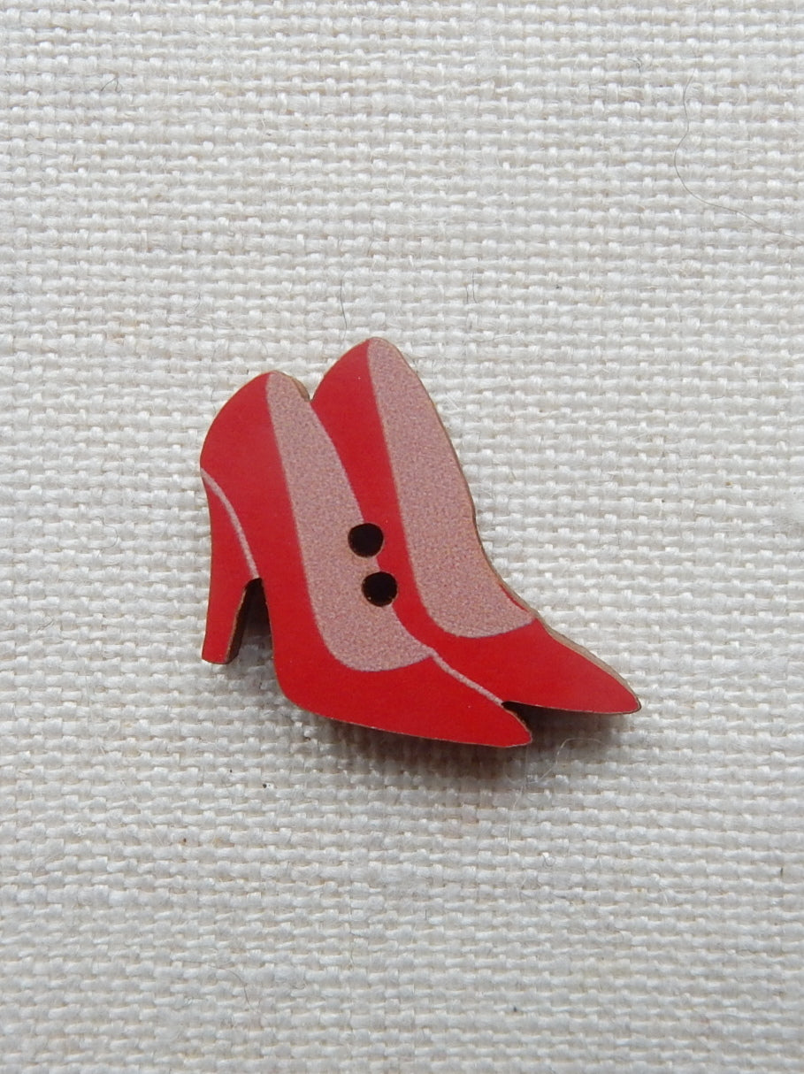 High heel button